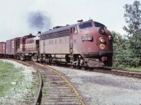 At a time when CP was short of power CGW F7 150 and CP RS-3 8449 power an eastbound at Bowmanville. The same day, June 22/66, MLW S-2 7093 was used on the Trenton way freight. Yard engines were rare this far out on the mainline and likely an unpopular idea with the crew. 