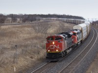 CN 371 coasts down through Lovekin with SD70M-2 8837 leading and SD60F 5553 right behind.