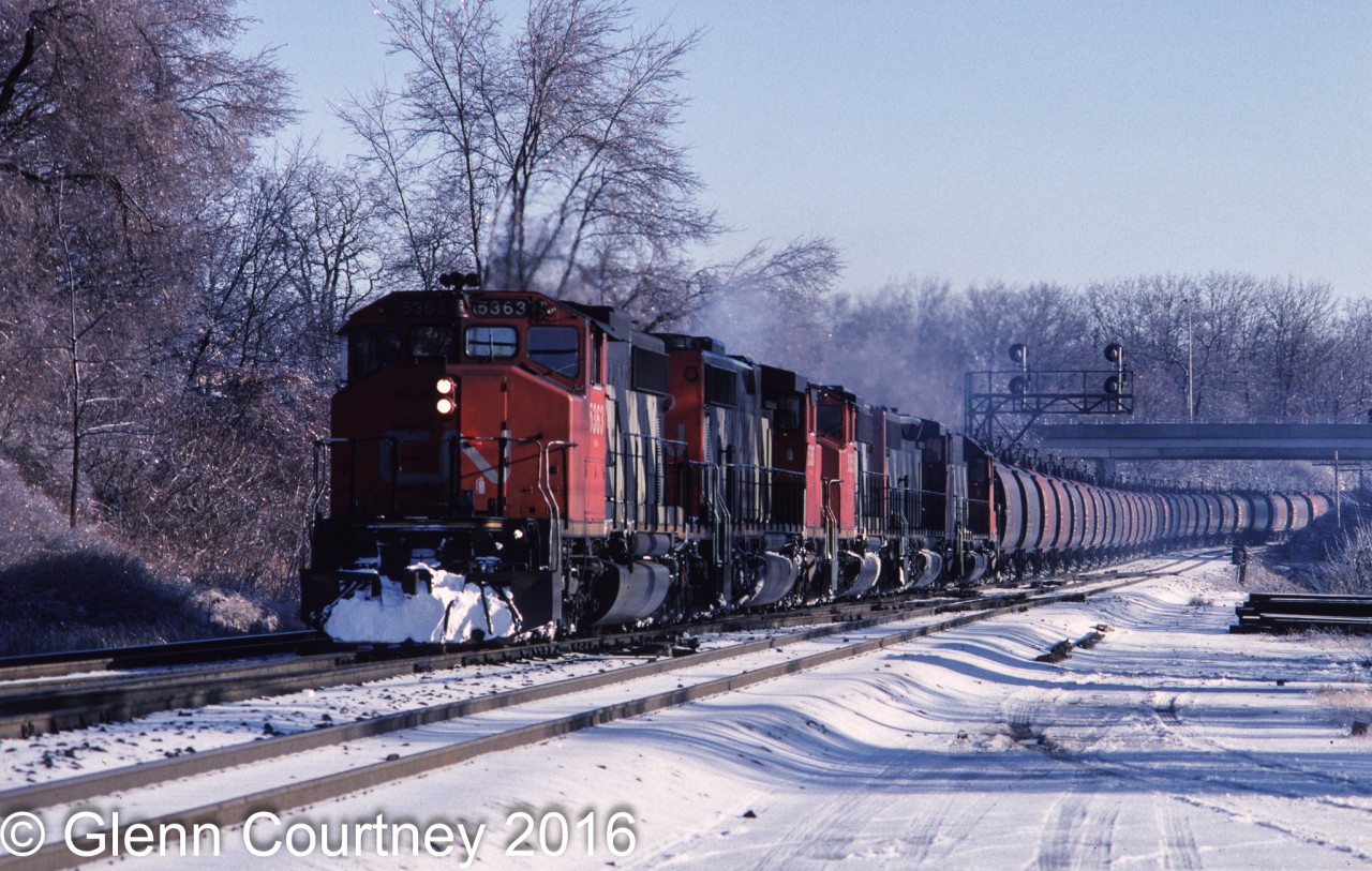 CN SD40-2W 5363 leads a quintet of SDs with Dofasco ore train #730 which has come off the Ontario Northland and will head straight into Dofasco to unload. The train is about 14 hours behind schedule due to the winter weather.