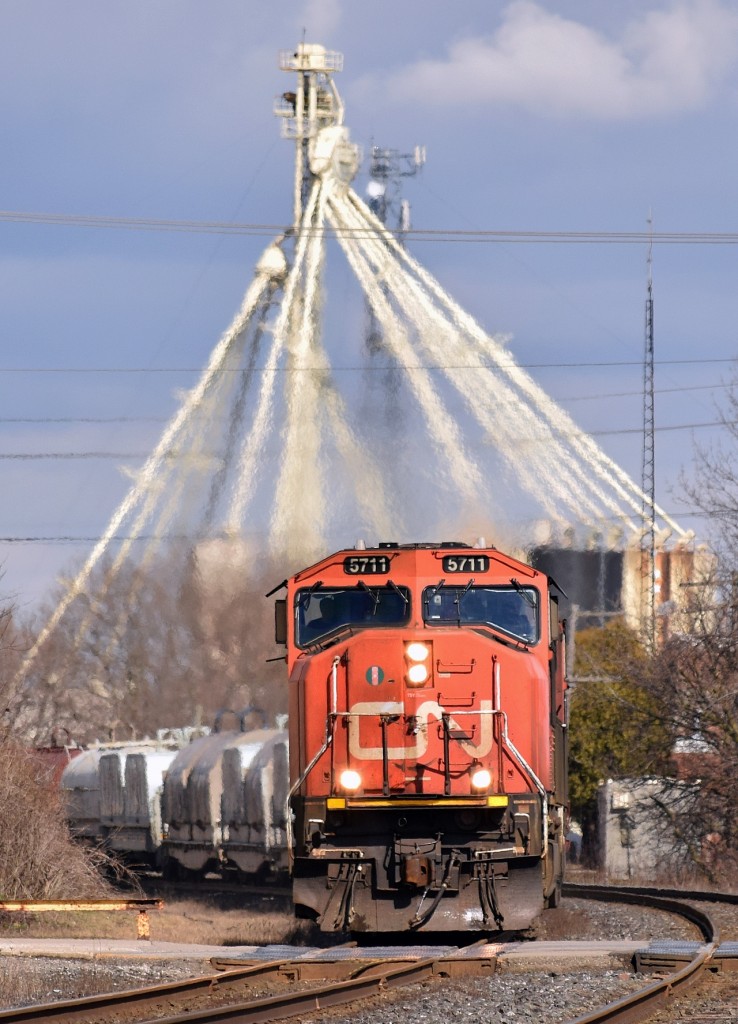CN 331 heads west through Ingersoll, passing by the VIA Station giving us a nice horn salute and a wave.