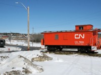 Wooden caboose CN 78642, the Sioux Lookout Auxiliary sits on display just south of yard and town of Sioux Lookout Ontario.  CN 78642 rebuilt in Moncton in 1948, was originally built by ACF in 1912 as GTW 83287.  Just across the road is an MLW 0-4-0 steam engine, Canada Creosoting 102 which was built in 1923 for the Quebec Development Company.  If you look closely at this photo, you can see the tail end of the wye  behind the caboose, along with the current CN office/bunkhouse in the background (building with the green roof).  Like many places in Northern Ontario, Sioux Lookout is a shadow of its former self railway wise with few signs of the rich railroading history still visible.  The town used to feature an 18 stall roundhouse, large yard and just east of Sioux Lookout at Superior Junction, the Graham Sub diverged southwards to Thunder Bay.  All that remains today is a small yard and empty fields where the servicing facilities used to be located.  The original station at Sioux Lookout has been renovated to serve passengers from VIA's Canadian.  CN crews still trade off here, with Winnipeg crews handling trains on the Redditt Sub and Sioux Lookout crews working the Allanwater sub to Armstrong.  As for the Graham Sub, it was abandoned and Superior Junction was renamed Superior.  You can still see where the word Junction was painted over and the former right of way climbing away from the mainline and heading south into the forest towards Thunder Bay.  