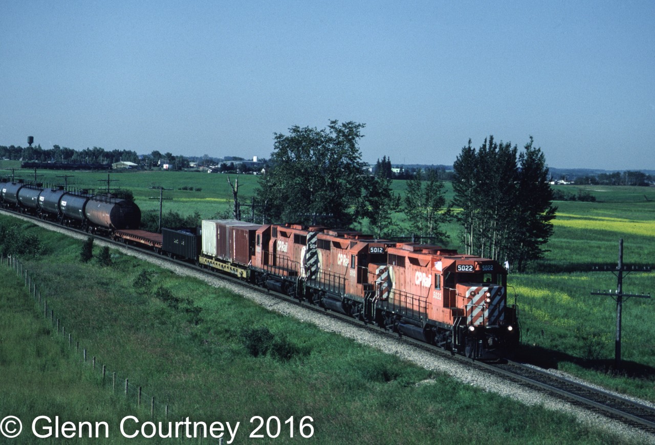 A trio of GP35s was not that common running together on CPR but here they are in all their faded glory heading north to Edmonton.