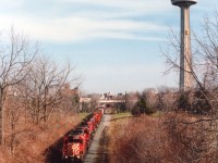 What a difficult time trying to place this image for the mapping!! After much consideration, I think I am on the back parking lot of a motel that was razed for the Fallsview Casino, and the train is right where that building is now. So much has changed. Indeed, this image, save for the Skylon Tower, could have been taken in the outskirts of town.  I am glad I took the time for this one. CP 5529, 5631, 5421, 5578, 5689 and 8239 are seen with a Toronto-bound train.