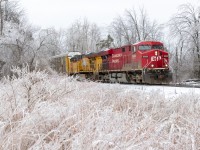 Five days into Spring, mother nature shows us otherwise as evidenced by this icy scene at Flamborough, Ontario. Although the ice-covered trees made for a photogenic scene, they have also caused power outages since late last night.