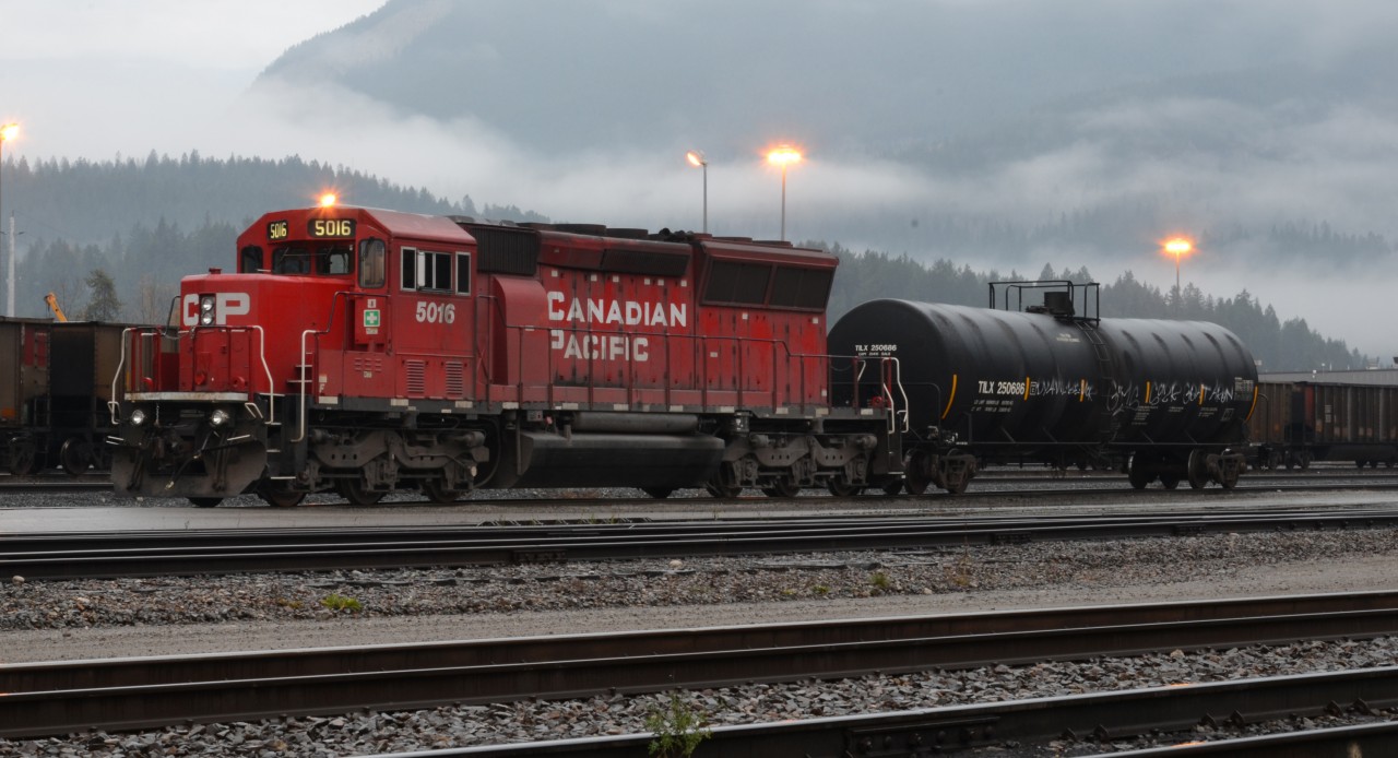Early morning fog  CP5016 sits waiting for yard duties.