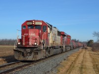 In perfect morning light, CP 246 heads South from Guelph Jct. with a storage evading SOO SD60 on point. Big thanks to Steve Host for the ride.