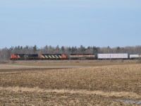 After doing push ups in the cab while waiting for the conductor at CN Snake, CN A435 is on the move through the country side to Brantford for work.