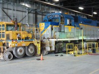 A surprise visit from a lightning stripe holdover this GP38-2 waits to be spotted on the wheel truing machine with the end caps off of #1 & #2 wheels. Built in 1972 as Lehigh Valley #317,acquired as part of the Conrail merger in 1976 and numbered 7317. It became part of Guilford Transportation in 1983 as GTI #223. CP acquired it in 1991 and it was renumbered Delaware & Hudson 7303 in 1992. 
