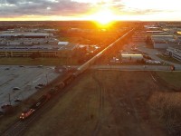 Knowing ground level locations are not easy to come by in Niagara, those that are available become repetitive quite quickly. You get the idea. Anyways, here is CN 330 passing through St. Catharines behind CN 5788 and 8000, solid EMD power, a welcome change from the constant GE power. As you can see, 330 is made up mostly of a mixture of autoracks and tankers, and is about 50 cars long. This is its typical consist here in Niagara. As you can see, some drivers have made their own shortcut pathway to the train station. The current legal routing off of Louth Street seen in the midground is much longer, and requires dodging through a residential neighbourhood. Maybe once GO Transit makes a commitment to rail service in Niagara, a reasonable access point from this street will be constructed. Lets hope though that GO's crazy ideas of trying to buy up every line they use don't fly with CN here.