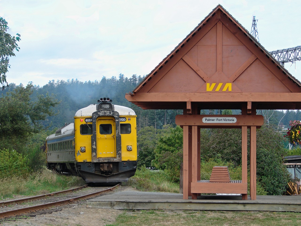 I Guess we can call this a "Fallen Flag"  In happier days for the Island Railway VIA RDC1's 6133 and 6135 depart the Palmer-Fort Victoria flag stop with the "Malahat".  This is train 299 the Sundays northbound from Victoria to Courtenay.  The service was suspended in 2011, 6135 was reasigned by VIA and 6133 sold to Industrial Rail Services in Moncton, NB.