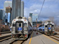 <b>Bound for Hudson and Vaudreuil.</b> Two Vaudreuil-Hudson AMT trains are boarding passengers at Lucien L'Allier station during the evening rush hour in downtown Montreal. AMT 111 at left will go all the way to Hudson (the only train to go that far all day) while AMT 25 at right will go to Vaudreuil.