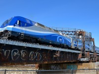<b>The mid-day departure for Mont-Saint-Hilaire.</b> AMT 1350 leads AMT 808 over the Lachine canal. This is the 1230 departure from Montreal's Central station for Mont-Saint-Hilaire on the south shore.