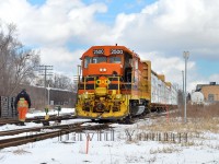 After grabbing their cars for Hunts Haulage off GEXR 580 and crossing over the mainline, the conductor walks towards his engine to begin their journey southward to Cambridge. The eighth and final car on the train is a load destined for Gillies Lumber.