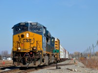 <b>Going straight through Huntingdon now.</b> Huntingdon used to be the point where a CN crew would hand CN 327 over to the CSXT crew, but this now takes place at a new siding a bit further south. Here CN CN 327 with CSXT 3284 & CSXT 5101 are going straight through the small and short Huntingdon yard, where train swaps used to occur.
