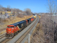 <b>Cowl leader on CN 401.</b> CN 401 has a cowl leader (CN 2444) along with CN 8002, CN 7275 & CN 218 as it passes through Montreal West on a gorgeous and warm afternoon.
