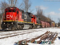 CN 331 accelerates up grade at Copetown with a pair of standard cab units in the form of CN 2010 and CN 5462 on a sunny February morning.
