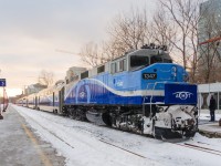 <b>An F59PH rebuild at sunset.</b> Rebuilt F59PH AMT 1347 will soon push AMT 189 for Saint-Jérôme out of Lucien L'Allier station during the evening rush hour in downtown Montreal.