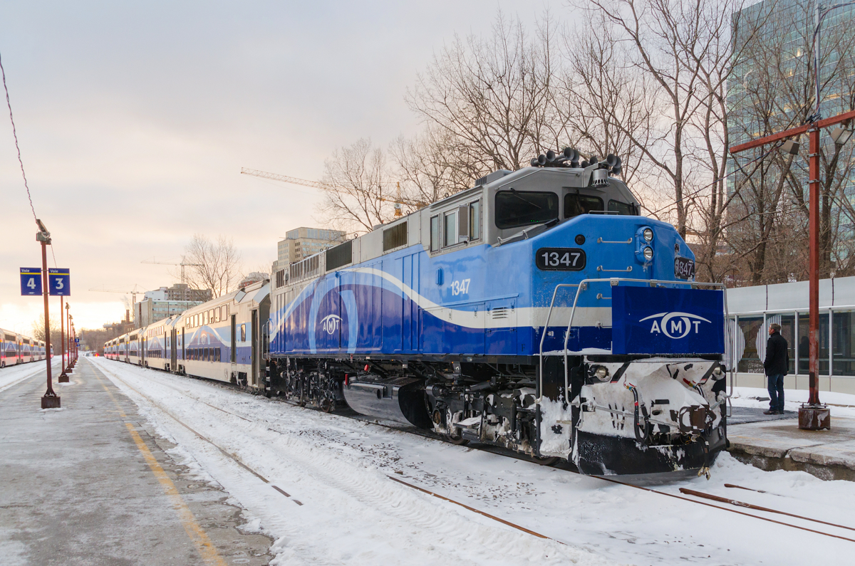 An F59PH rebuild at sunset. Rebuilt F59PH AMT 1347 will soon push AMT 189 for Saint-Jérôme out of Lucien L'Allier station during the evening rush hour in downtown Montreal.