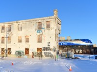 <b>Seen better days.</b> Wellington Tower, out of use for about 15 years now is looking rather forlorn as AMT 1359 leads AMT 814 past it on a sunny evening. 