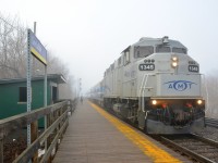 <b>Arriving in thick fog.</b> AMT 1345 has just arrived at Lasalle station with AMT 72 from Candiac in the thick fog.