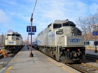 <b>White and grey F59PH's.</b> AMT's ex-GO Transit F59PH's sport a number of paint schemes and here two variations are visible at the end of the morning rush hour in downtown Montreal. AMT 1341 at left is in white paint, while AMT 1345 at right is in grey paint. AMT 1345 has just arrived with AMT 72 from Candiac.