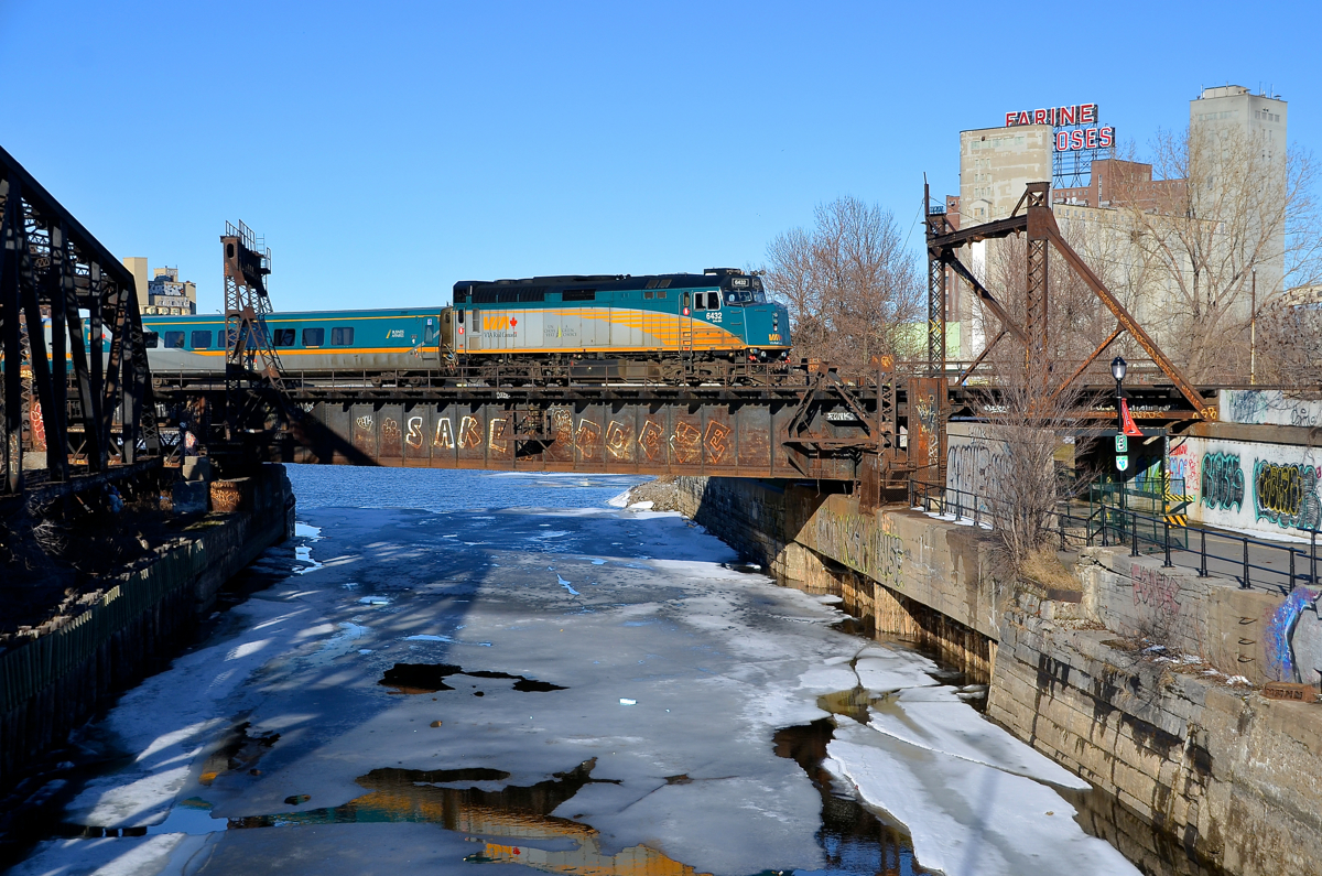 VIA 6432 leads VIA 37 for Fallowfield over the Lachine canal.