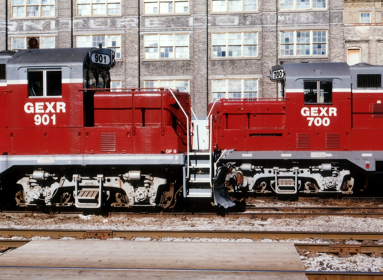 I'm not into artsy-fartsy type photos, but sometimes when out and about an opportunity presents itself for something a little different, and I give in...  While waiting at Kitchener VIA for #432 to happen by, I looked at these two locomotives and I thought.."Its mating season", even though it is only late February. Just the way they lined up was different........... the 901 and the 700 now both off the roster. The 901 has been scrapped; I remember a long time back it was set off on an industrial siding somewhere near Seaforth and I never saw it run again. The 700, according to CTG, went to Cape Breton.