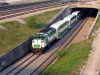 Back when the flurry of AM commuter trains into Toronto were all powered by F59PH's (that nobody really batted an eye over), GO Transit 537 brings Lakeshore West train #492 inbound to Union Station, seen popping out from under the flyunder between Spadina Avenue and Bathurst Street.