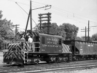Grand River Railway freight motor 224 sits on the interchange tracks with the CPR in front of Galt Station in 1961, nearing the end of her career during the last year of GRR/LE&N electric operations.
