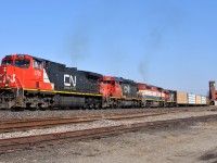 435 passes through Brantford with IC 2705 - CN 5379 - BCOL 4605 - CN 4136 and 20 cars