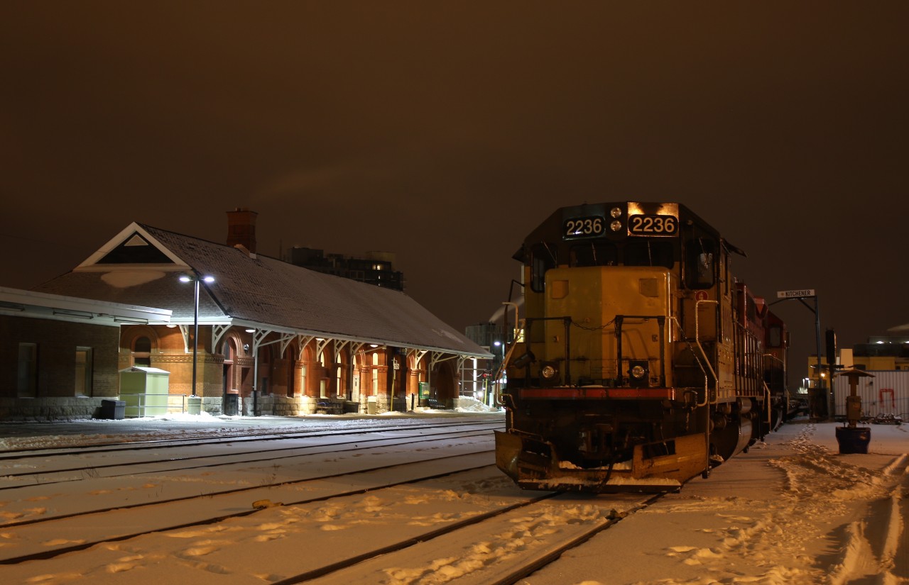 It's 4am and all is quiet this frigid morning as light flurries fall. GEXR power for train 580 idles away in the cold with a pair of flat cars. In a couple of hours the station and platform will come alive with commuters heading to work in Toronto but for now the only action is a pair of workers tossing salt on the stations walkways preparing for the morning rush.