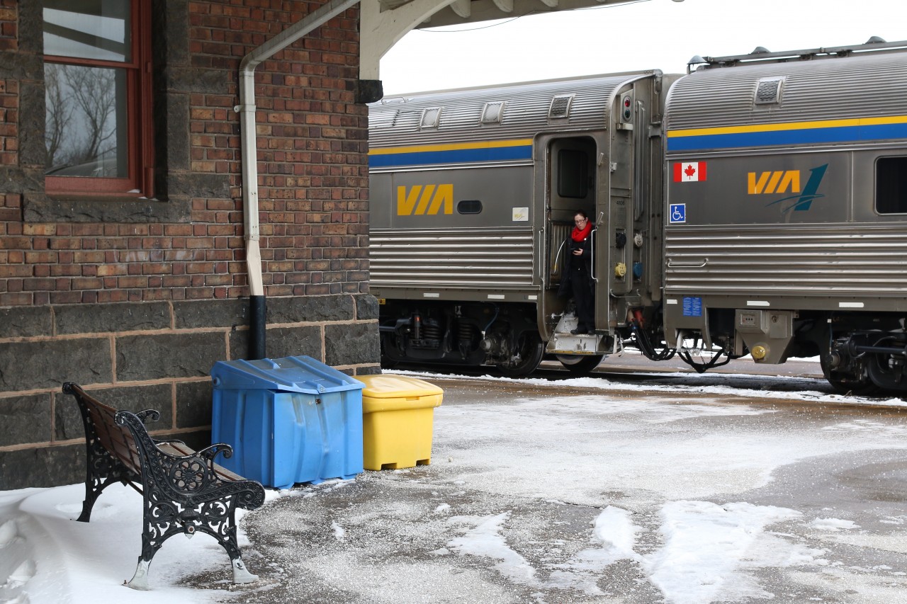 For many years train crews relied on pocket watches to make sure their train was always on schedule. Today the cell phone has replaced the pocket watch as seen here as a train crew member makes sure train #70 is still on schedule, then signals to the engineer.
