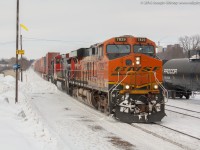 CN 396 makes a late daylight appearance in Brantford with BNSF 7829 leading a pair of IC units on a snowy February 2014 morning.  I believe snow storms the day before had made more missed connections which explains the cut of intermodal on the head end of 396 on this day.  Back in 2014 Foreign Power or FPON as we like to call it was plentiful on CN and it was not uncommon to get a foreign leader up here at the time...man I miss those days.