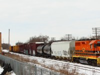 Gatineau Quebec 2500 has been servicing the industries along the Goderich Exeter main line at MM49.5 on the Guelph Sub and is about to cross Edinburgh Rd in Guelph.