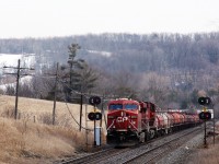 After waiting for CP 246 to clear the Hamilton sub, CP 247 lead by CP 8850 with CP 8609 power their way up the hill through the signals approaching Canyon Road and MM37 on the Galt sub. The Glen Eden ski hill on the Niagara Escarpment can be saw on the left but with the warm weather, the slopes may not be covered with snow for long.