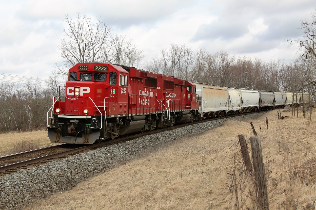 The daily pick up train is making its return trip back to Galt with a pair of GP20C-ECO's for power once again. CP 2222 is leading CP 2265 around the bend approaching the Victoria Rd crossing and MM44 of the Galt sub