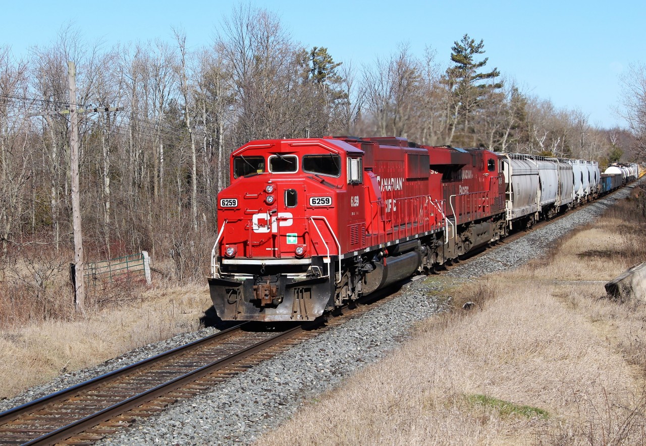 It was a good day to find Ex-Soo's leading the trains but this one was the one the rail fans came out for. One of the only 4 GMD SD60M's made, now CP 6259 along with CP 8936 make their way past MM 43 on its way to Blandford.