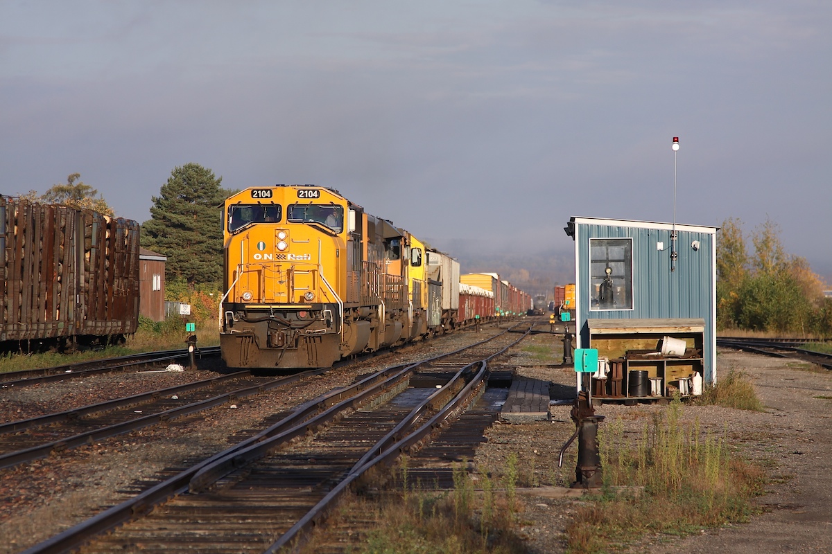 Passing by the weigh scales, 214 begins her southwards journey as the mist clears on a cool autumn morning.