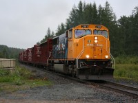 After some significant delay by a track crew fixing a defect up ahead, Ontario Northland train 213 (Englehart to Cochrane) heads north through the driving rain near Dane, Ontario.

Hot on its heels is train 211 for Rouyn-Noranda, and both trains were sitting nose to tail about 15 miles north of Englehart for a while. 213 is actually here running under a "Work" authority between Englehart and Swastika Junction allowing 211 to be given a clearance to the junction "protecting against the Work 2101" so the two trains can advance themselves without constant track releases and incremental clearances from the dispatcher (the ONR line is un-signaled).