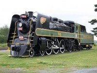 Beautifully restored (cosmetically) Temiskaming & Northern Ontario/Ontario Northland Railway steam engine no. 701 stands proudly beside the Englehart station, which no longer sees passenger trains, but still serves as the local ONTC bus terminal and ONR dispatcher's office.