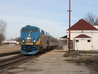 Limited stop express passenger train no. 73 flies past the rather spartan facilities at Ingersoll.