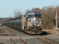 Part of a small parade of late afternoon westbounds on the Galt sub, unit ethanol train no. 647 passes through the town of Ayr, Ontario.