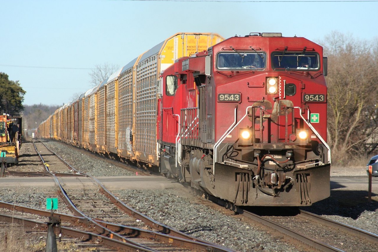 CP train no. 147 (solid autorack service) finishes up a 4-train parade of late afternoon westbounds on the Galt subdivision, following T69, 255, and 647.