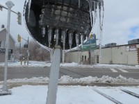 A well iced signal. Anything that was facing south during the recent freezing rain got a pretty good coating of ice. This signal governs the crossing of Essa Road which is interlocked with the traffic signals. The freestanding gong bell is part of the arrangement as well as a "no right turn" sign on the opposite side of the street. At one time, the Cafe beans was a Tim Horton's and it would serve as a pit stop for the Barrie-Collingwood crews.