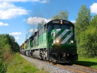 <b>A quartet of C30-7's.</b> A quartet of GE C30-7's (MMA 5023, MMA 5017, MMA 3609 & MMA 3000) leads MMA 2 over the ex-CP Sherbrooke Sub in September 2010. 