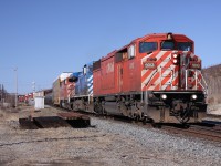 With two red barns and a bluebird providing power, CP 222 is about to take the switch onto the Parry Sound sub and continue southwards towards Toronto.