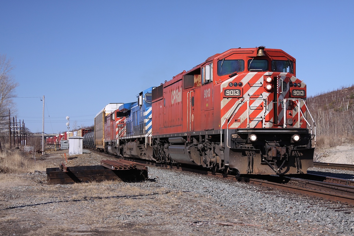 With two red barns and a bluebird providing power, CP 222 is about to take the switch onto the Parry Sound sub and continue southwards towards Toronto.