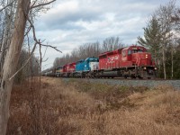 This is one of those photos that can be filed under the 'it won't happen again' category. On a cloudy day in November of 2011, an eclectic quartet of EMD's are seen working their way down the Hamilton Subdivision with ethanol train # 626. Later that evening, Eric Portelli and I saw The Sheepdogs play at Copps Coliseum in Hamilton. Hard to believe that this photo was taken over four and a half years ago!