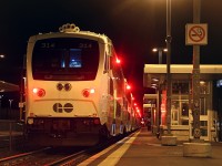 GO Transit's 300 series cabcars have quickly ingrained themselves into the system in the past few months. Like many recent additions to GO Transit, I am reluctantly learning to accept them as real. If anything though, the excessive white colour on the noses with the new paint scheme is what really puts the ugly out there. In the link below, you can see the original intended design for the new cabcars, which I personally didn't think was that bad. 
<br> <br>
http://www.railwaygazette.com/uploads/pics/tn_ca-gotransit-bombardier-bilevel-revised-impression.jpg
<br> <br>
Rants aside, this is one of the many Toronto bound GO trains that is about to depart Clarkson. Although extremely difficult to see, three highball signals are visible in the distance. The signals are at Clarkson Road, Lorne Park Road and Port Credit interlocking respectively. 
<br> <br>
My intended purpose to railfan here was to catch CN 551 work Clarkson yard. However, I quickly learned over my scanner that the GO train's crew was not happy with my presence, and reported me to the RTC to have GO Transit police called. It was an annoying reminder that many GO train crews have been poorly educated on what railfans are, and why I generally avoid GO stations. I can recall several past incidents with GO employees, in which I've now been reported three times and briefly investigated once by the RCMP. I think I will return to avoiding GO stations for photography...