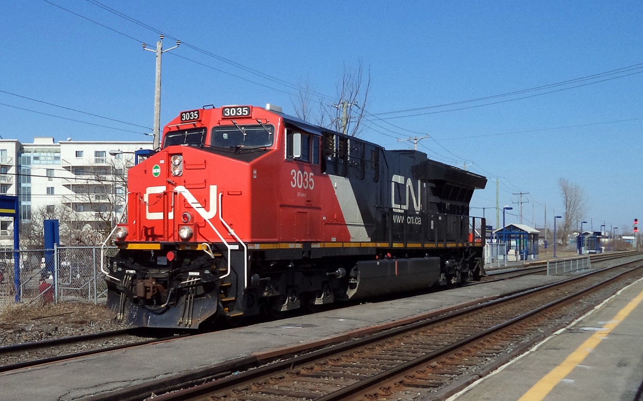 cn-3035 ef-644T COMING FROM THE EAST SOUTHWARK YARD GOING TO TACHEREAU YARD NEAR DORVAL P.Q.